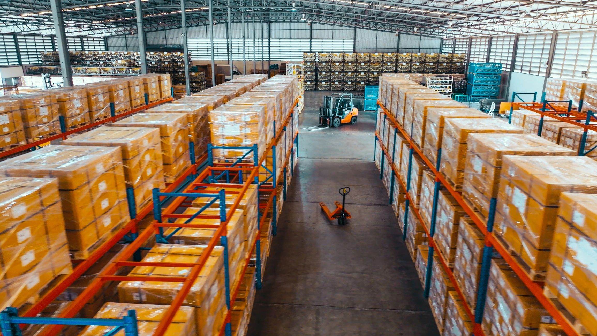 Warehouse shelves with packaged inventory ready to ship