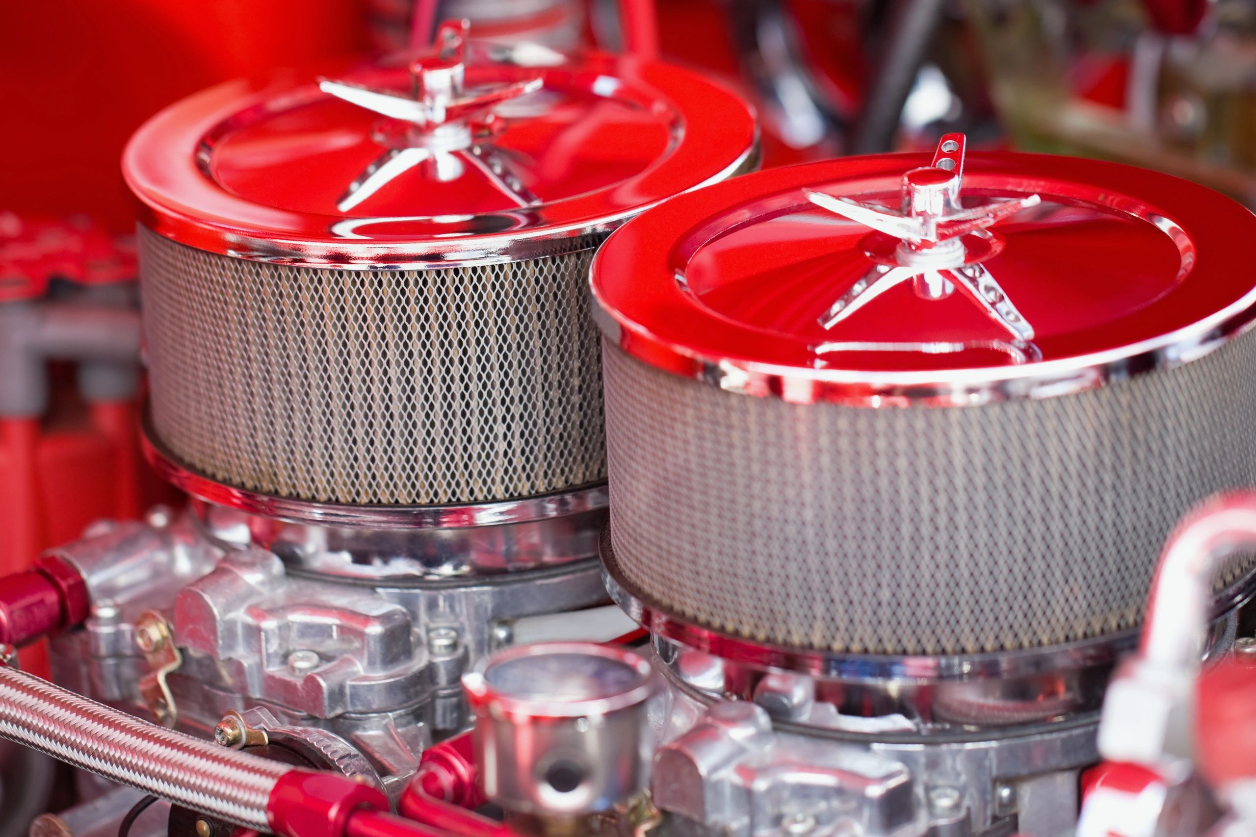 Engine bay with air filters and carburetors