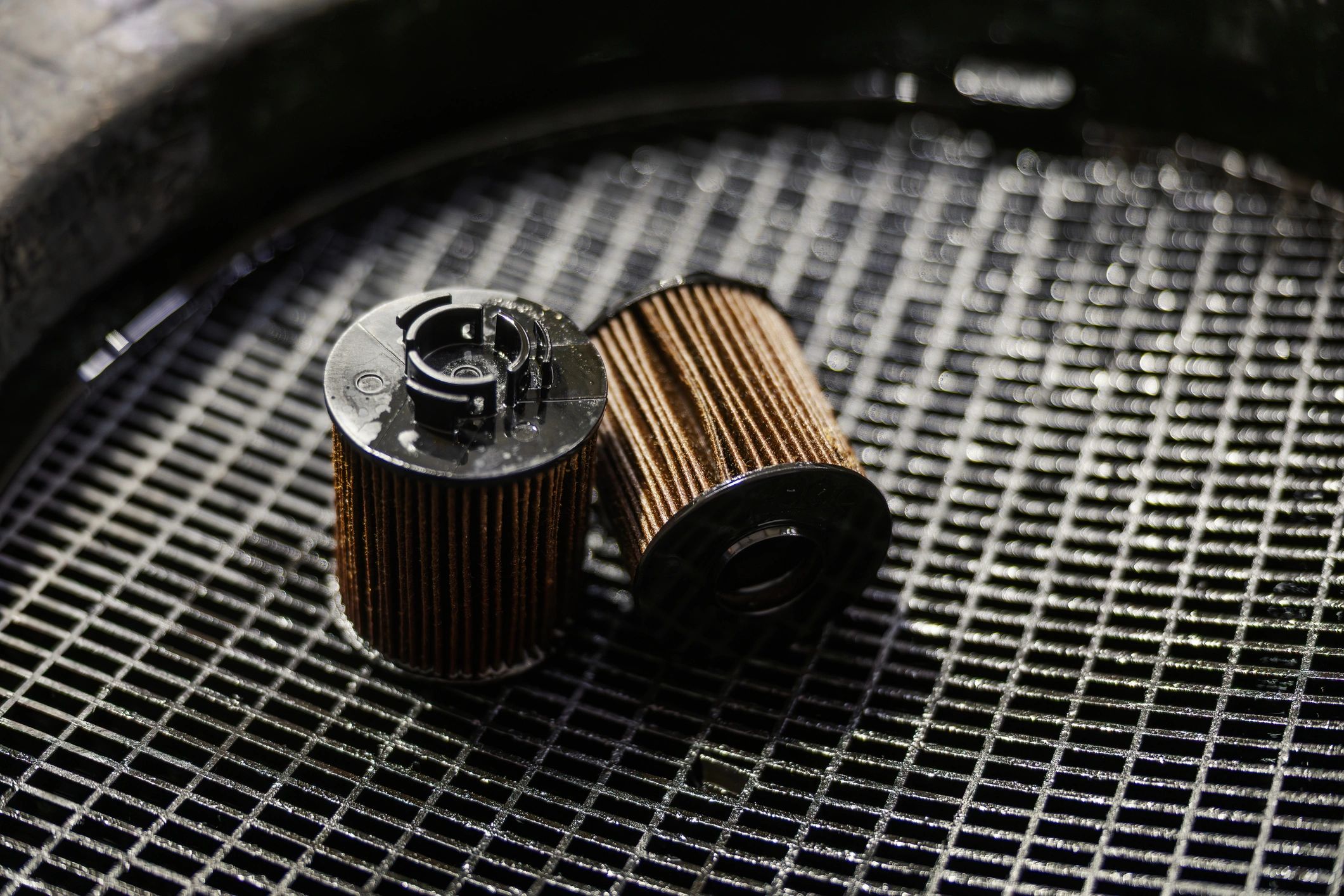 Used oil filters lined up, representing routine maintenance